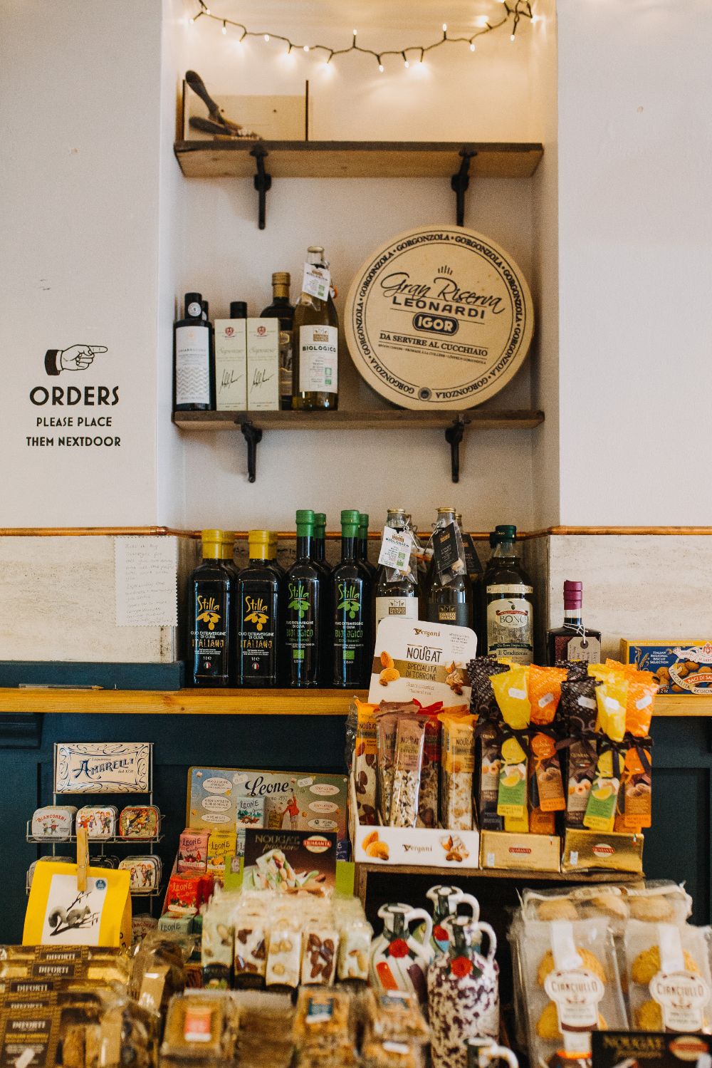 Italian food and drink displayed on shop shelves